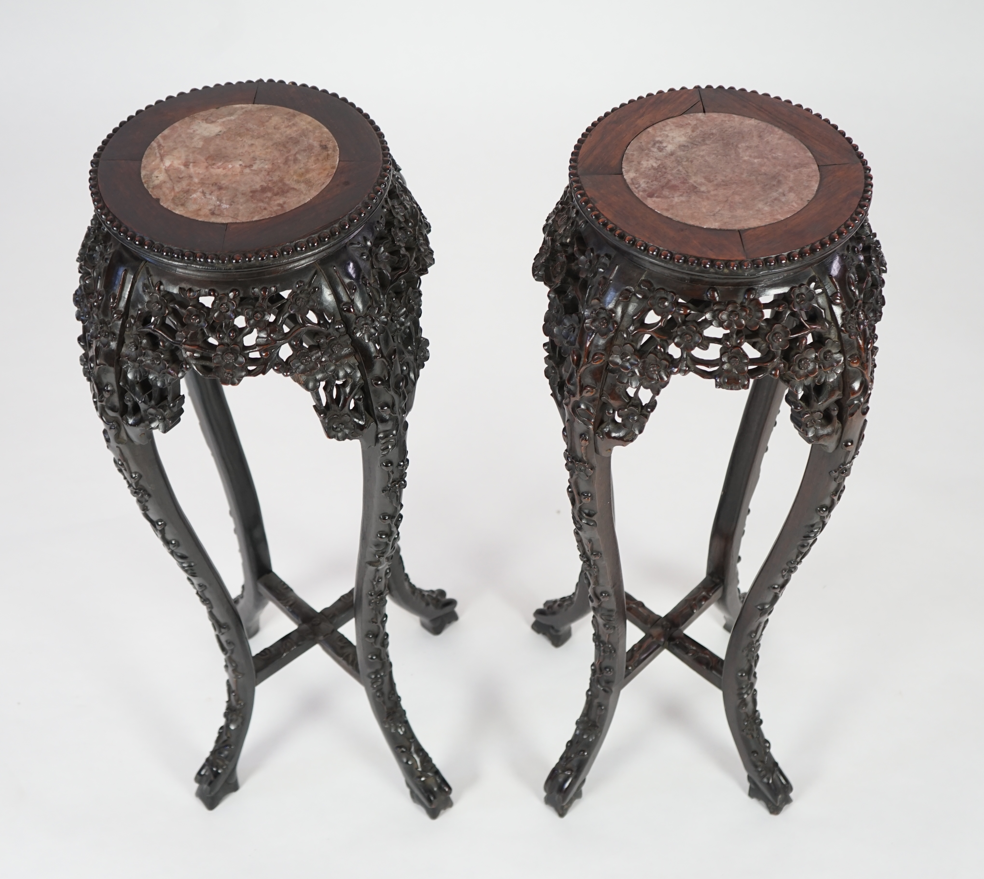 A pair of late 19th century Chinese hongmu and marble inset vase stands, height 91cm. Condition - fair to good